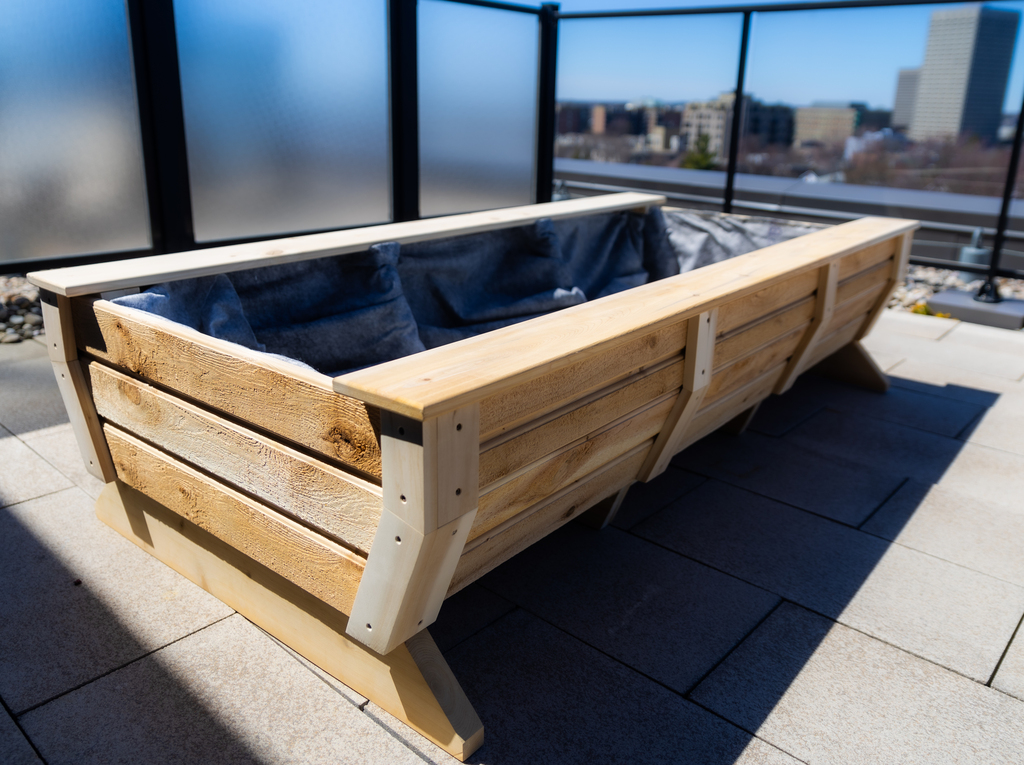 Custom raised white cedar garden bed featuring a built-in protective wire mesh critter cage enclosure with hinged access doors by Matteout.